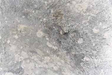 Soyut grunge ve çatlamış çimento parçacıklı duvar kağıdı arka planı, web pankartı ve tasarım şablonu için beton aşınmış yüzey.