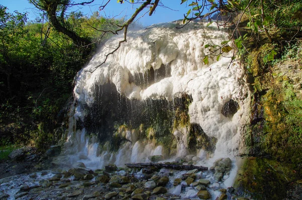 Nokalakevi hot springs. Small waterfall of thermal water. Georgia, Samegrelo-Zemo Svaneti region