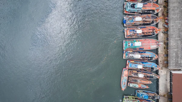 Big fishing boats standing at the sea in Phuket, Thailand. Aeria — Stock Photo, Image