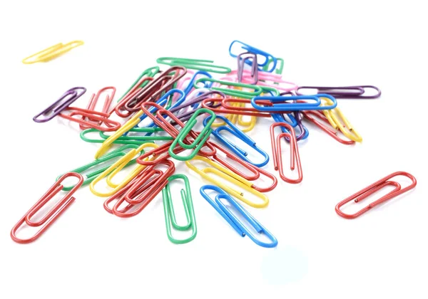 Joined colored paperclips on white background Royalty Free Stock Images