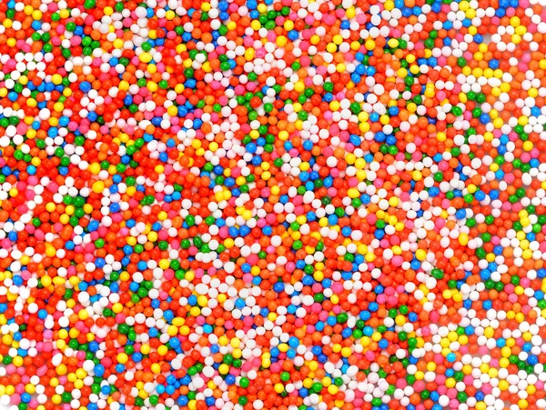 Background of colorful sprinkles, jimmies for cake decoration or ice cream topping — Stock Photo, Image