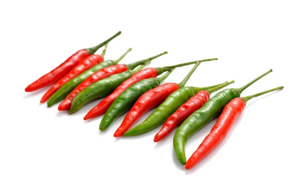 Hot red and green chili or chilli pepper isolated on white backg — Stock Photo, Image