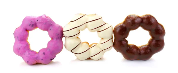 Färgglada donuts isolerat på vit bakgrund — Stockfoto