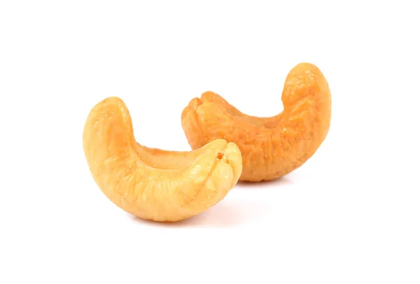 Geroosterde cashewnoten geïsoleerd op witte achtergrond — Stockfoto