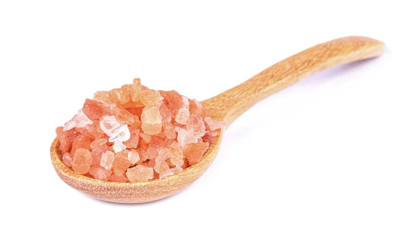 Pink Himalayan salt on a wooden spoon isolated on white backgrou — Stock Photo, Image