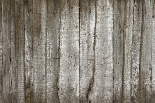 Cerca cinza velho feito de madeira com traços de tinta branca — Fotografia de Stock