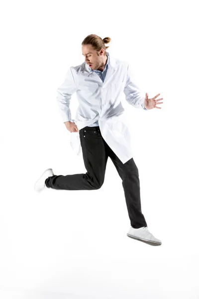 Doctor in white coat jumping — Stock Photo, Image