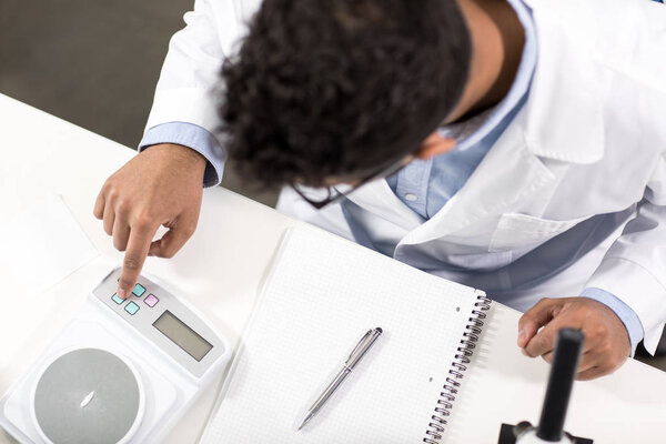 Young scientist in laboratory 