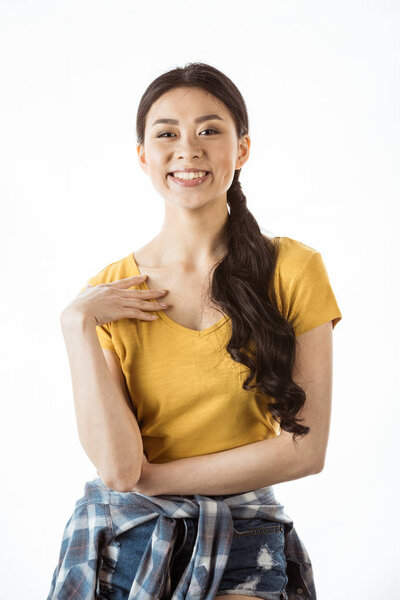 happy asian girl looking at camera