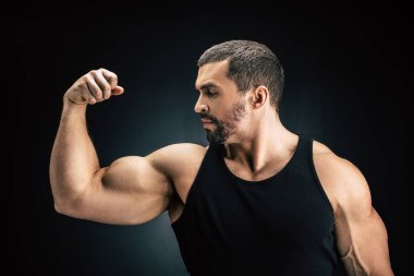 strong man showing muscles clipart