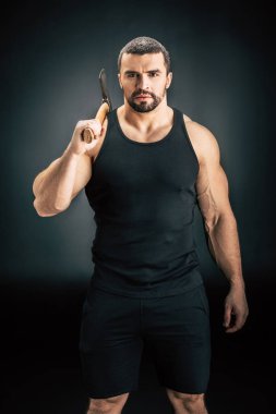 sportive man holding axe