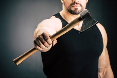 sportive man holding axe