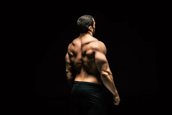 Shirtless sportive man showing muscles — Stock Photo, Image