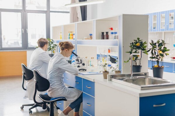 scientists in biological laboratory