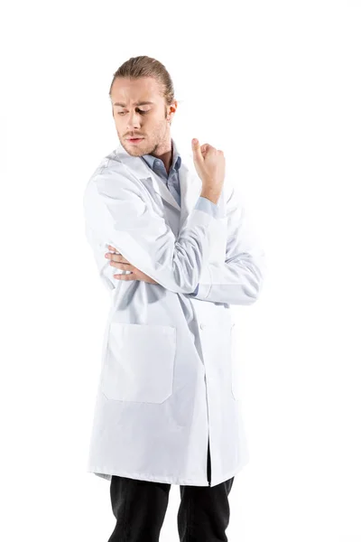 Pensive doctor in white coat — Stock Photo