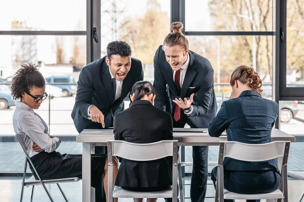 Businesspeople arguing at meeting in office — Stock Photo
