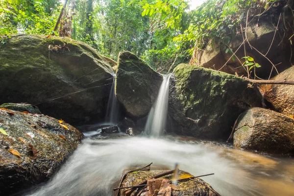 Kathu Waterfall in the tropical forest area In Asia, suitable for walks, nature walks and hiking, adventure photography Of the national park Phuket Thailand,Suitable for travel and leisure.