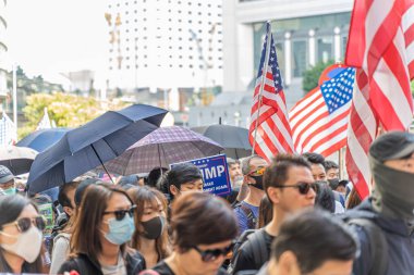Hong Kong - 29 Kasım 2019: Hong Kong İnsan Hakları ve Demokrasi Yasası 'nı geçirerek ABD Başkanı Donald Trump' tan yardım isteyen barış yürüyüşü.