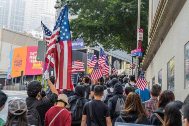 Hong Kong - 29 Kasım 2019: Hong Kong İnsan Hakları ve Demokrasi Yasası 'nı geçirerek ABD Başkanı Donald Trump' tan yardım isteyen barış yürüyüşü.