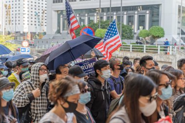 Hong Kong - 29 Kasım 2019: Hong Kong İnsan Hakları ve Demokrasi Yasası 'nı geçirerek ABD Başkanı Donald Trump' tan yardım isteyen barış yürüyüşü.