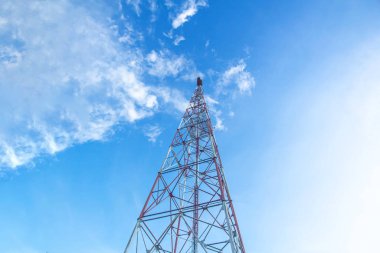 Telecommunication tower against,on the hill Blue sky with cloud bright at Phuket Thailand.