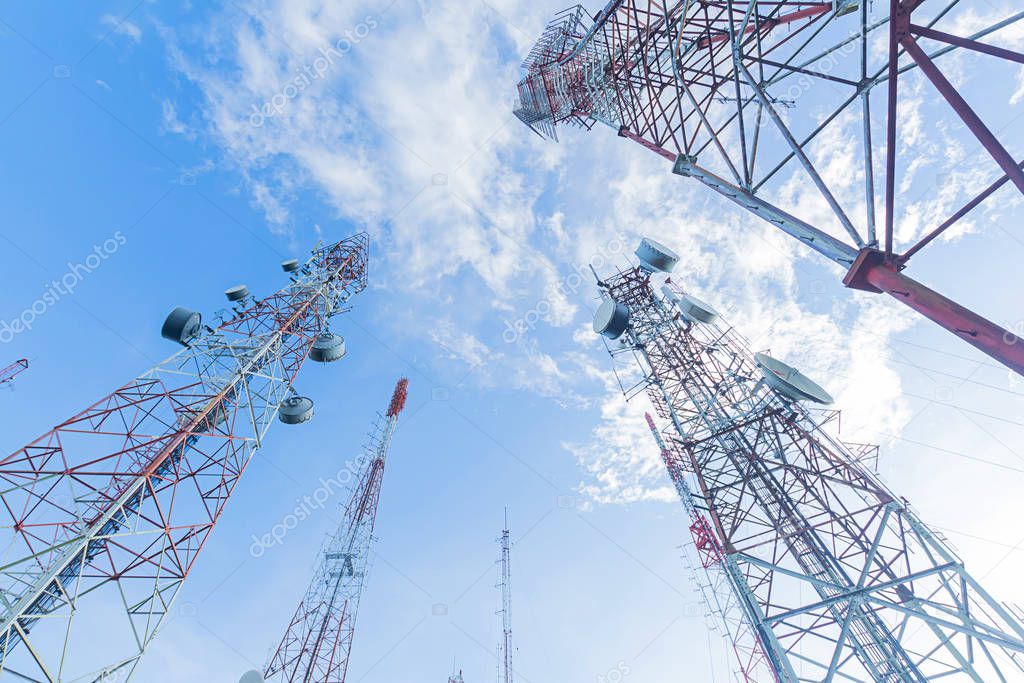 Telecommunication mast TV antennas in the afternoon ,on the hill blue sky with cloud bright at Phuket Thailand.