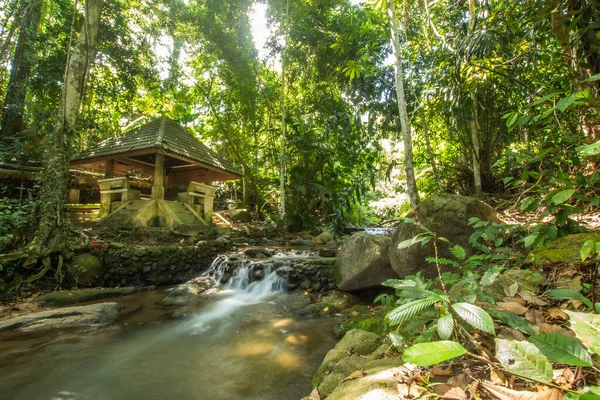 Kathu Waterfall in the tropical forest area In Asia, suitable for walks, nature walks and hiking, adventure photography Of the national park Phuket Thailand,Suitable for travel and leisure.