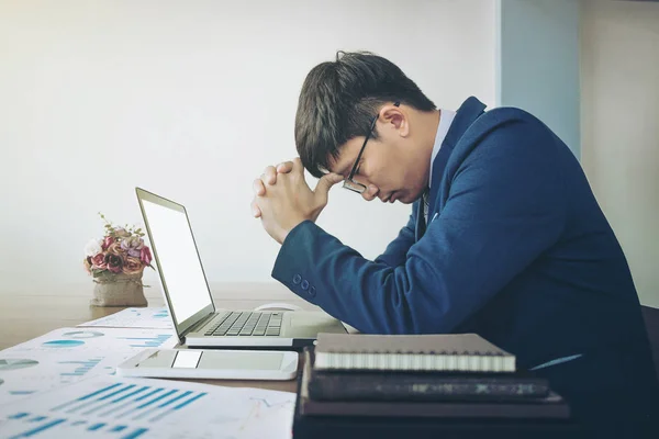 Businessman stressed out at work in casual office