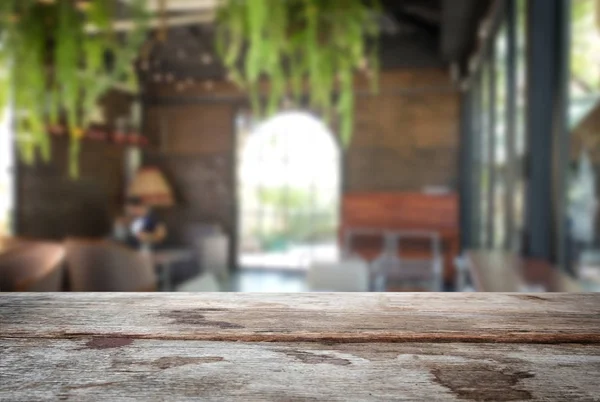 Selected focus empty old wooden table and coffee shop cafe or re — Stock Photo, Image