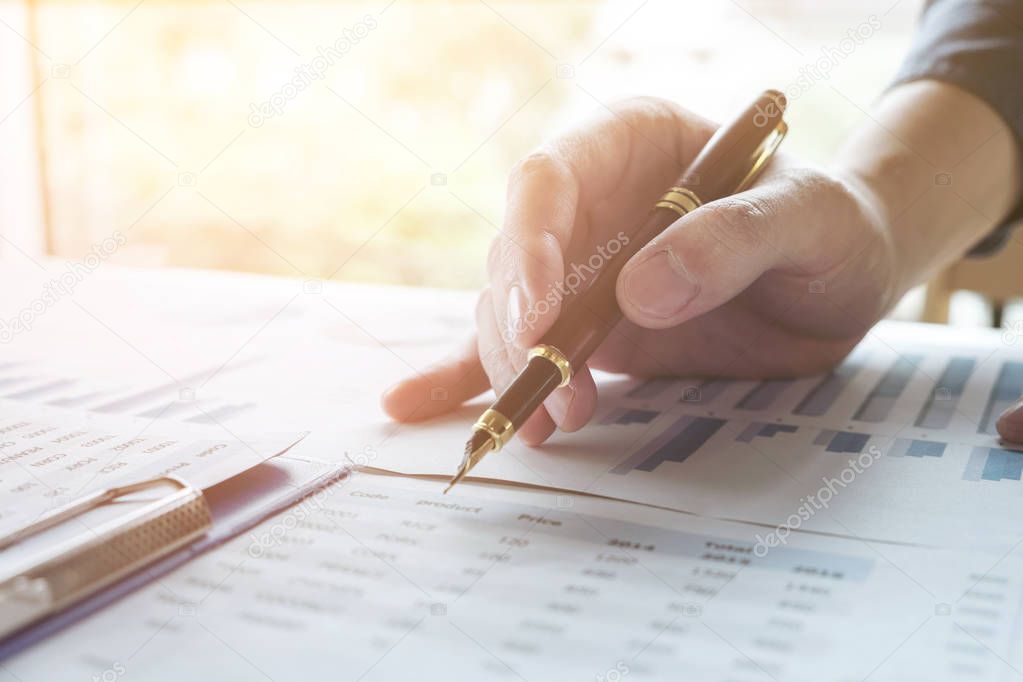 Business man working analyzing data in office, Image of confiden