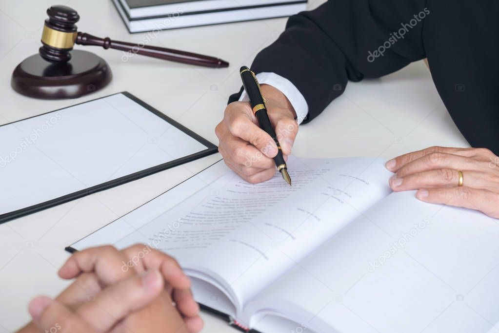 Close up of gavel, Male lawyer or judge Consult with client and 