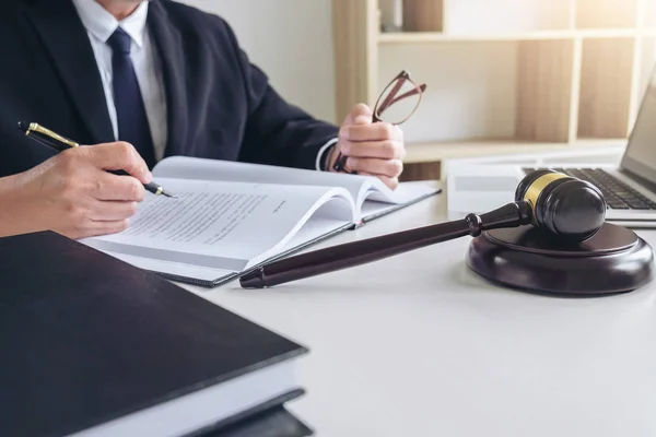 Close up of gavel, Male lawyer or judge working with Law books, — Stock Photo, Image