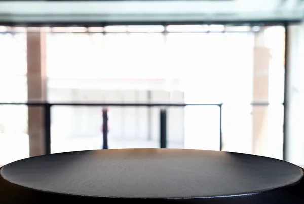 Image of Selected focus empty wooden table and Coffee shop or bl — Stock Photo, Image