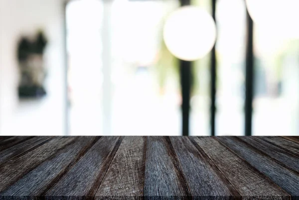 Eski siyah ahşap masa boş ve soyut arka plan bulanıklık 