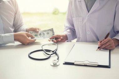 Doktor bozulması para dolar iş adamı formundan alınan.