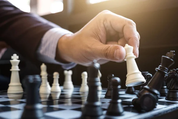 Businessman`s Hand Playing Chess Game To Development Analysis Ne Stock  Photo - Image of competition, business: 123928716