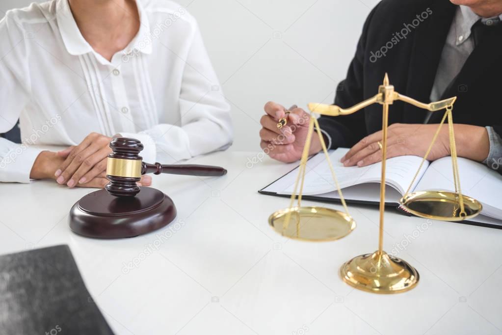 Close up of gavel, Male lawyer or judge Consult with client and 