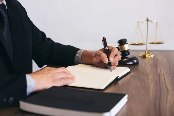 Judge gavel with scales of justice, male lawyers working having — Stock Photo, Image