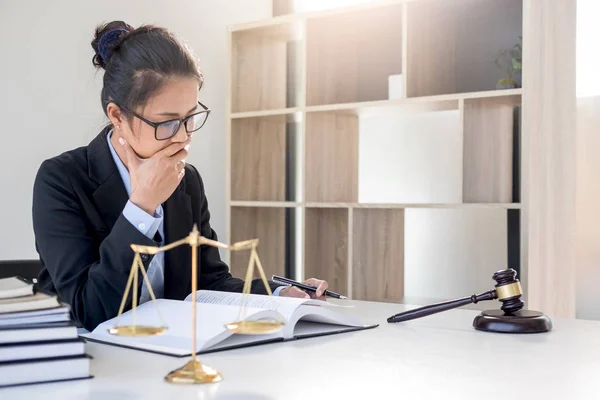 Judge gavel with scales of justice, professional female lawyers — Stock Photo, Image