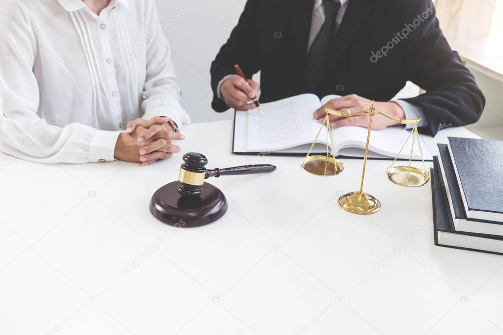 Close up of gavel, Male lawyer or judge Consult with client and 
