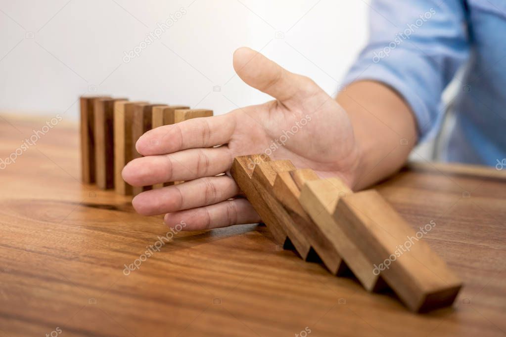 Risk and strategy in business, Close up of businessman hand stop