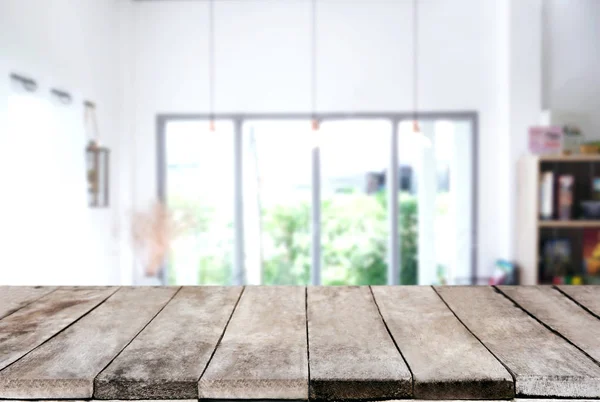 Empty wooden table and blurred background of abstract in front o — Stock Photo, Image