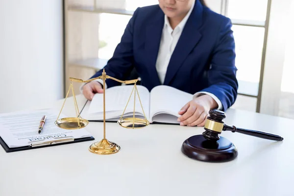 Judge gavel with scales of justice, professional female lawyers — Stock Photo, Image