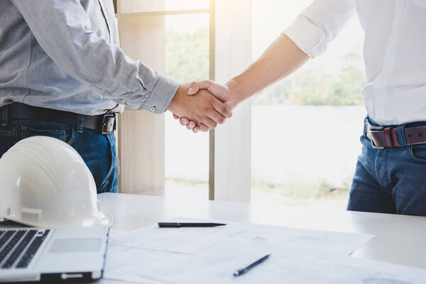 Two engineer or architect meeting for project, handshake after c