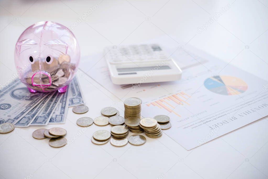 Piggy bank and money with business document, business finance in