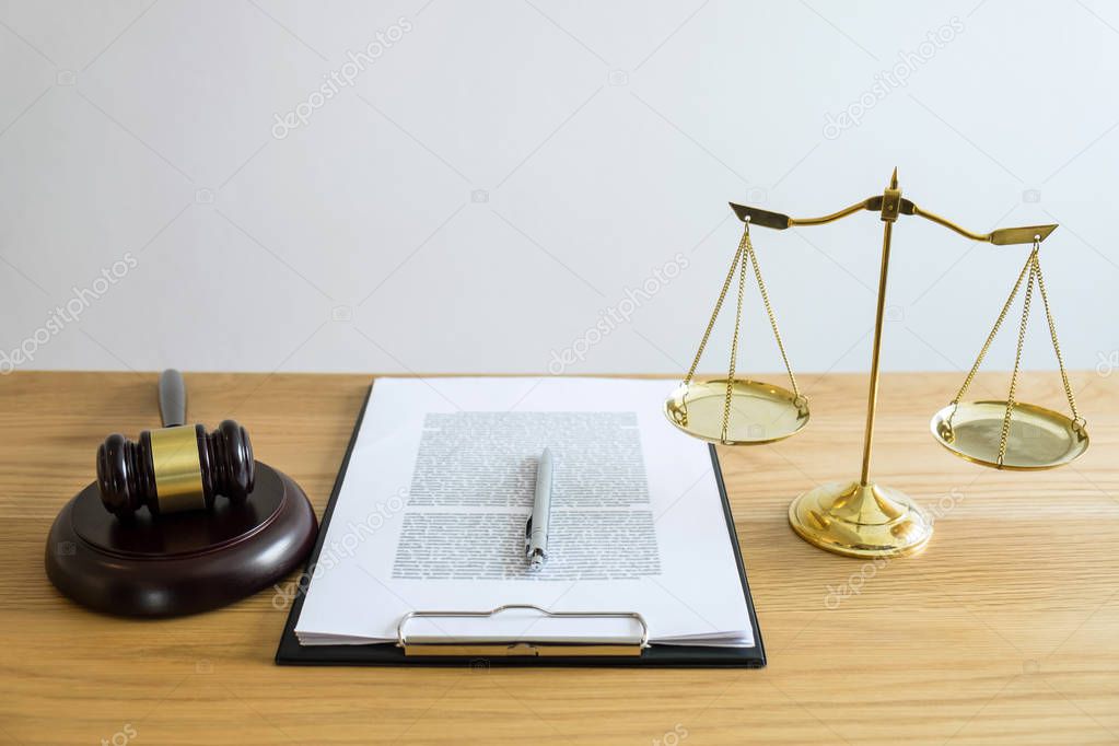 Scales of justice and Gavel on sounding block, object and law bo