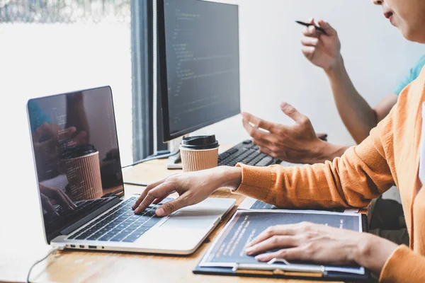 Programmers cooperating at Developing programming and website wo — Stock Photo, Image