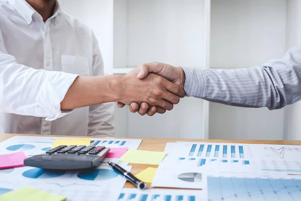 Teamwork partnership meeting concept, Business handshake after discussing good deal of Trading contract for both companies and gesturing people connection deal, Meeting and greeting of collaboration.