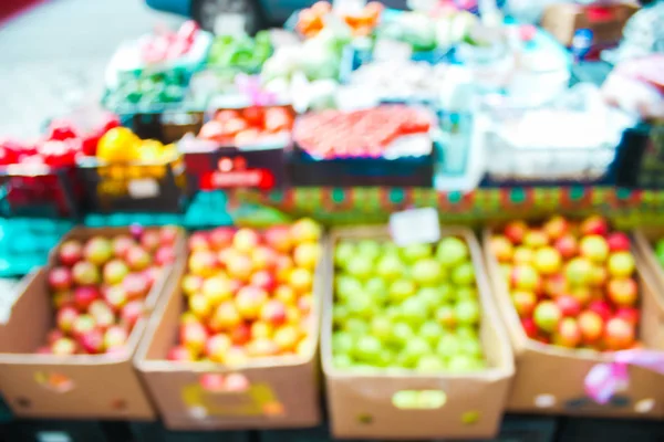 Frukt i bazaar suddiga bakgrunden på bakgrunden — Stockfoto