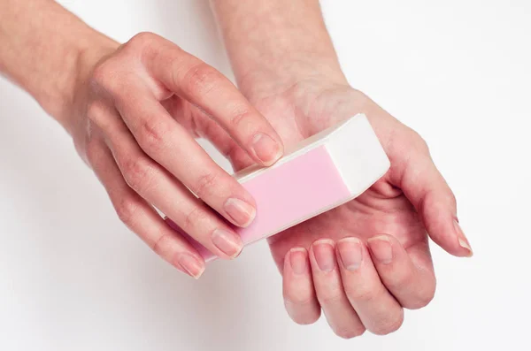 Filling nails on the light background — Stock Photo, Image